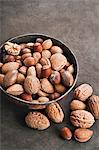 Assorted nuts in a metal bowl