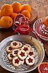 Jam biscuits with blood orange jelly