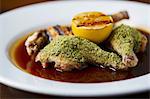 Chicken legs with a herb crust and lemon