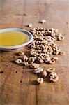 Honey puffed wheat next to a dish of honey