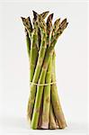 A bunch of green asparagus against a white background