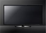 Black LCD tv screen hanging on a wall .  (with clipping work path)