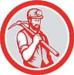 Illustration of a coal miner hardhat holding carrying crossed pick axe on shoulder set inside circle done in retro woodcut style on isolated white background.