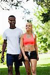 young couple runner jogger in park outdoor summer sport lifestyle