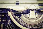 Close up vintage portable typewriter with ink ribbon