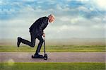 senior man riding a scooter active and energetic