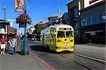 SAN FRANCISCO, CA, USA - : Yellow tram on the streets of San Francisco