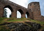 Very old ruins built of stone and green grass