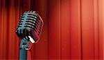 3d retro microphone on red curtain background, copy-space for your text