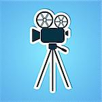 Grey retro movie camera icon on blue background