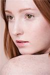 Close up portrait of young woman, looking away