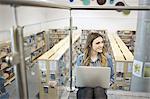 Young woman using laptop