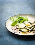 Raw zucchini,parmesan and pinenut salad