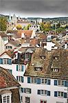 Europe, Switzerland, Zurich, a view across the roofs of the old city centre of Zurich with the steeple of the Fraumunster cathedral