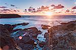Rocky coast at Treyarnon Bay at sunset, Cornwall, England, United Kingdom, Europe