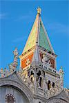 Campanile and detail of the facade of the Basilica di San Marco, dating from the 11th century, Piazza San Marco, San Marco, Venice, UNESCO World Heritage Site, Veneto, Italy, Europe