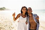 Young couple on Arpoador beach, Rio De Janeiro, Brazil