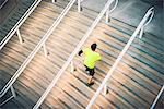 Mature male runner training on steps