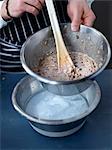 Placing the bowl of mixture in a bigger bowl full of freezing water