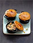 Smoked salmon casseroles sealed with pastry