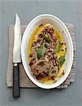 Leg of lamb in sage butter with walnuts
