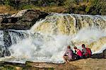 Tourists watching the stunning Murchison Falls (Kabarega Falls), Murchison Falls National Park, Uganda, East Africa, Africa