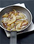 Pan-fried sliced pears with cinnamon