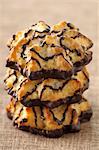 Three stacked coconut and chocolate Rochers