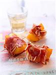 Apricots and Serrano ham bites