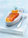 Salmon with mandarin puree and coconut puree