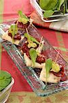 Swedish bread,sun-dried tomato and guacamole canapés