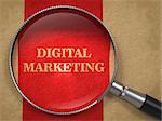 Digital Marketing Inscription Through Magnifying Glass on Red Background