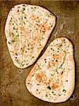 close up of rustic indian garlic and cilantro naan bread