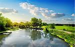 Footpath by the river at beautiful sunrise