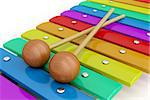 Colorful wooden xylophone with mallets, close-up image