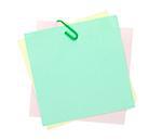 Colorful post-it notes with clip. Isolated on white background