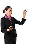 Serious businesswoman in suit gesturing with hands on white background