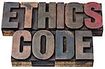 ethics code  - isolated words in vintage letterpress wood type with ink patina