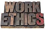 work ethics - isolated word in vintage letterpress wood type with ink patina