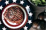 American steak on a plate in a still life