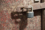 Very old door with a latch and lock