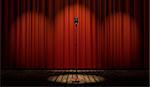 3d vintage microphone in spot light on stage with red curtain