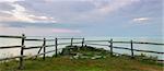 Panorama of a wooden fence on ocean shore in the morning  (South Shore, Nova Scotia, Canada)