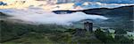 Dolwyddelan Castle and the Afon Lledr valley, misty morning at sunrise. Snowdonia, North Wales.