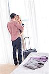 Romantic young couple in hotel room