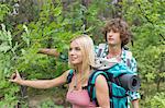 Young couple hiking in forest