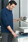 Man using photocopier