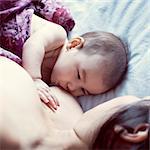 Mother breastfeeding baby