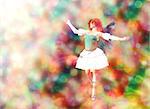 Fantasy fairy on colorful background with bokeh light effect.