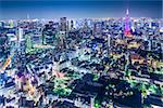 Tokyo, Japan city skyline with Tokyo Tower and Tokyo Skytree in the distance.